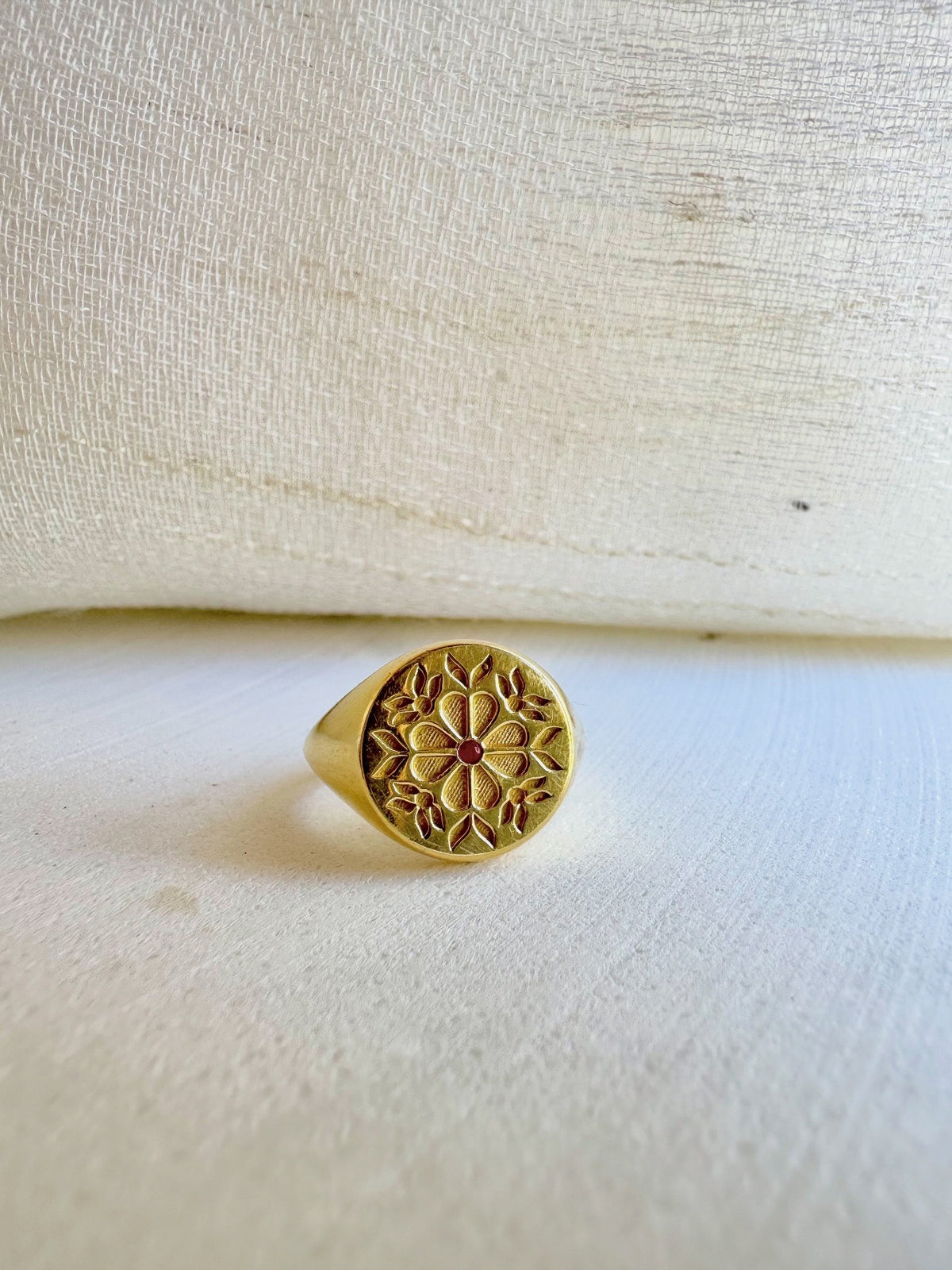 Gold Tatreez pinky ring with floral engraving and a center stone | Yasmin Nabulsi Fine Jewelry