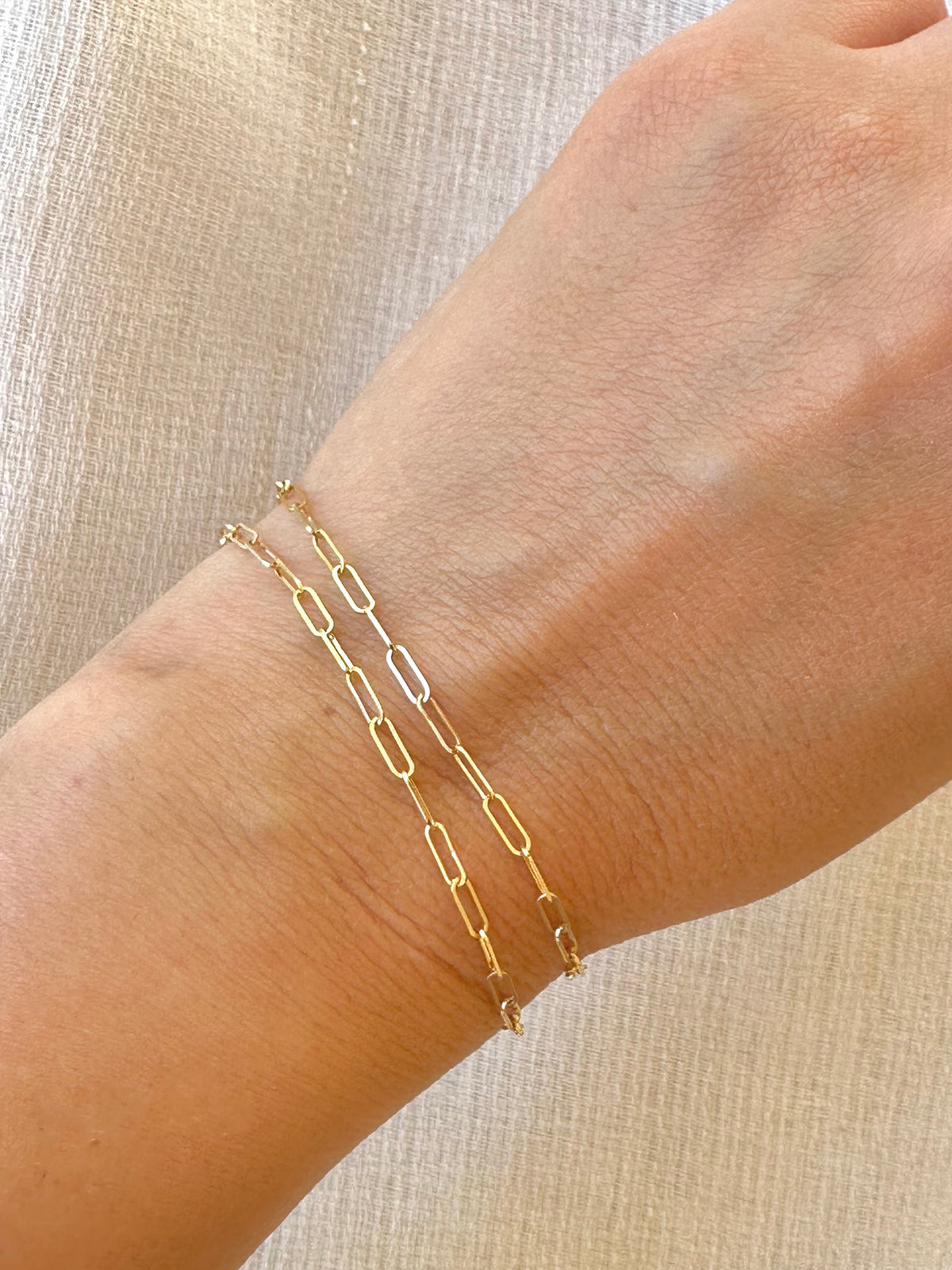 18K solid gold dainty paperclip bracelet with a spring clasp | Yasmin Nabulsi Fine Jewelry