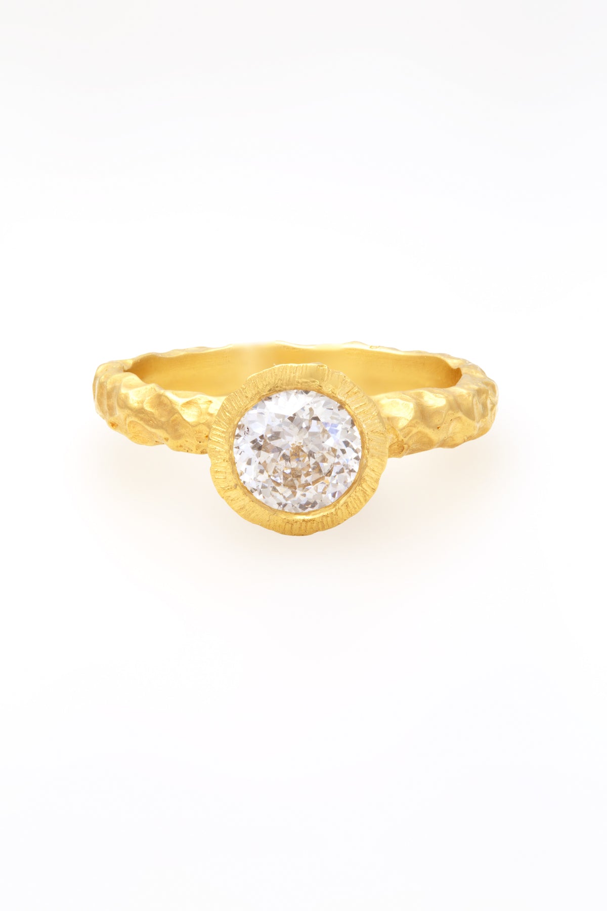 Glypto Solitaire Ring, hand carved hammered gold band with a bezel set round diamond, top view | Yasmin Nabulsi Fine Jewelry