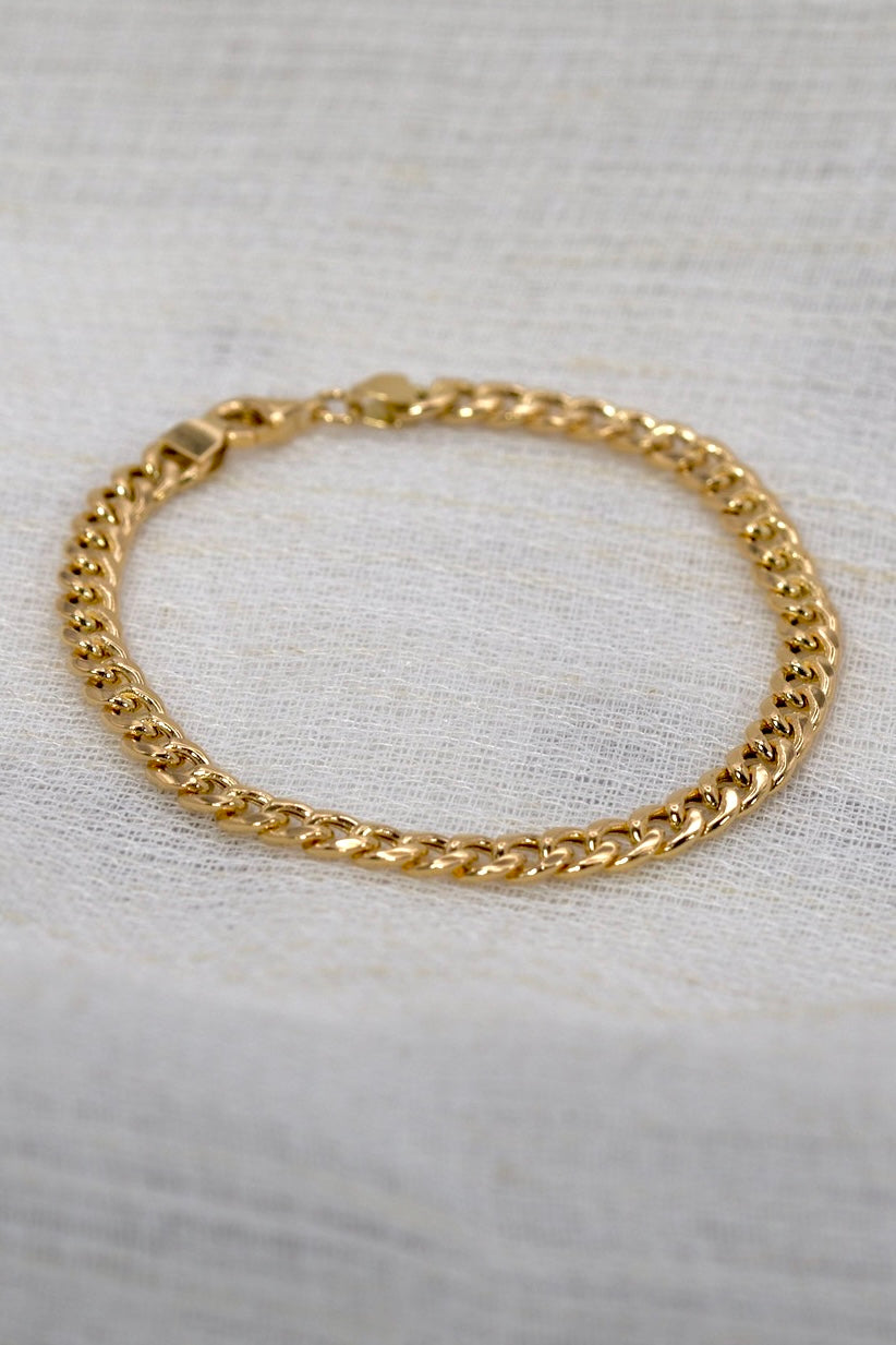 18K solid gold Cuban link bracelet with a lobster clasp | Yasmin Nabulsi Fine Jewelry