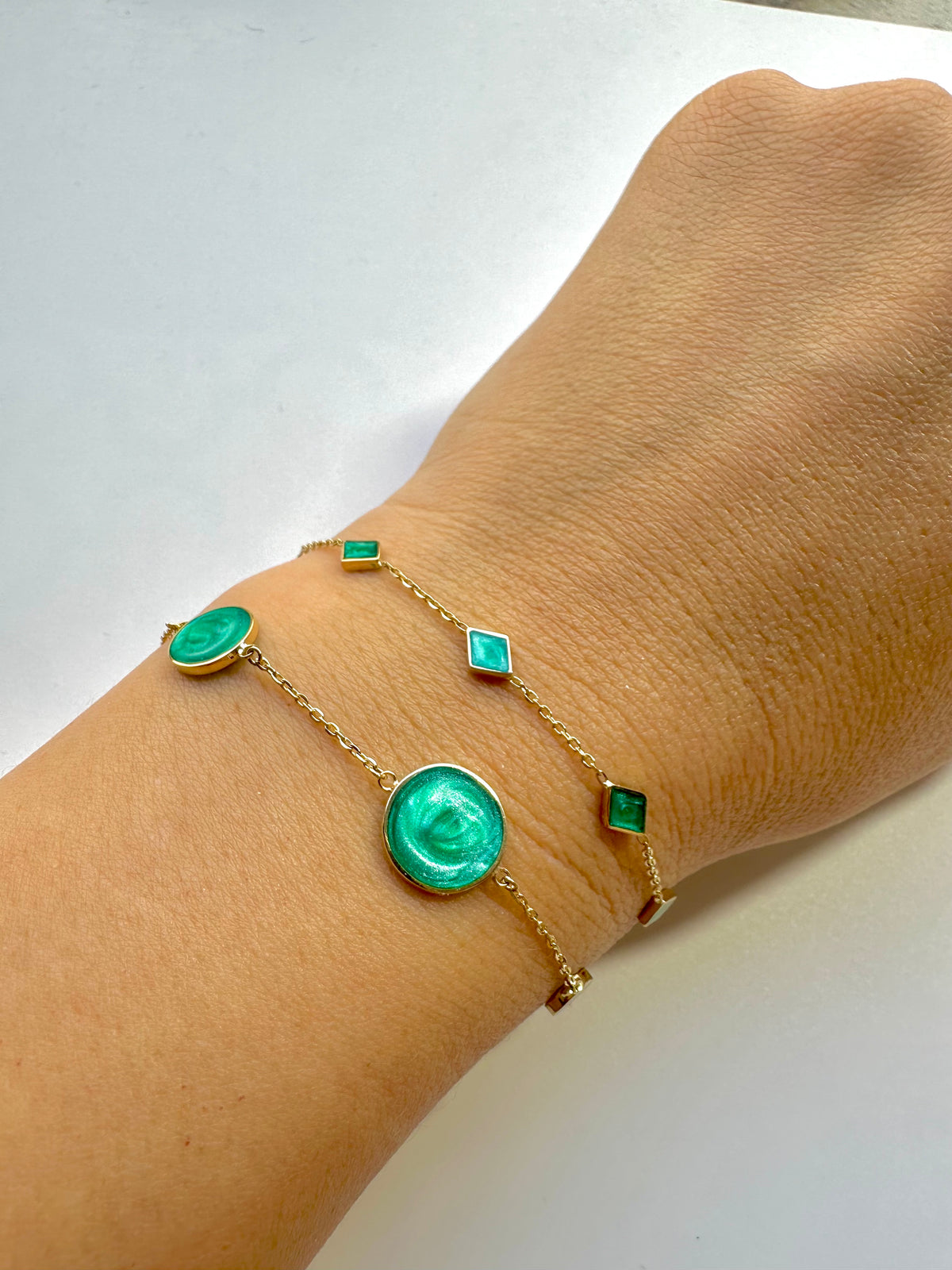 Green enamel circles on a dainty 18K gold chain, second view
