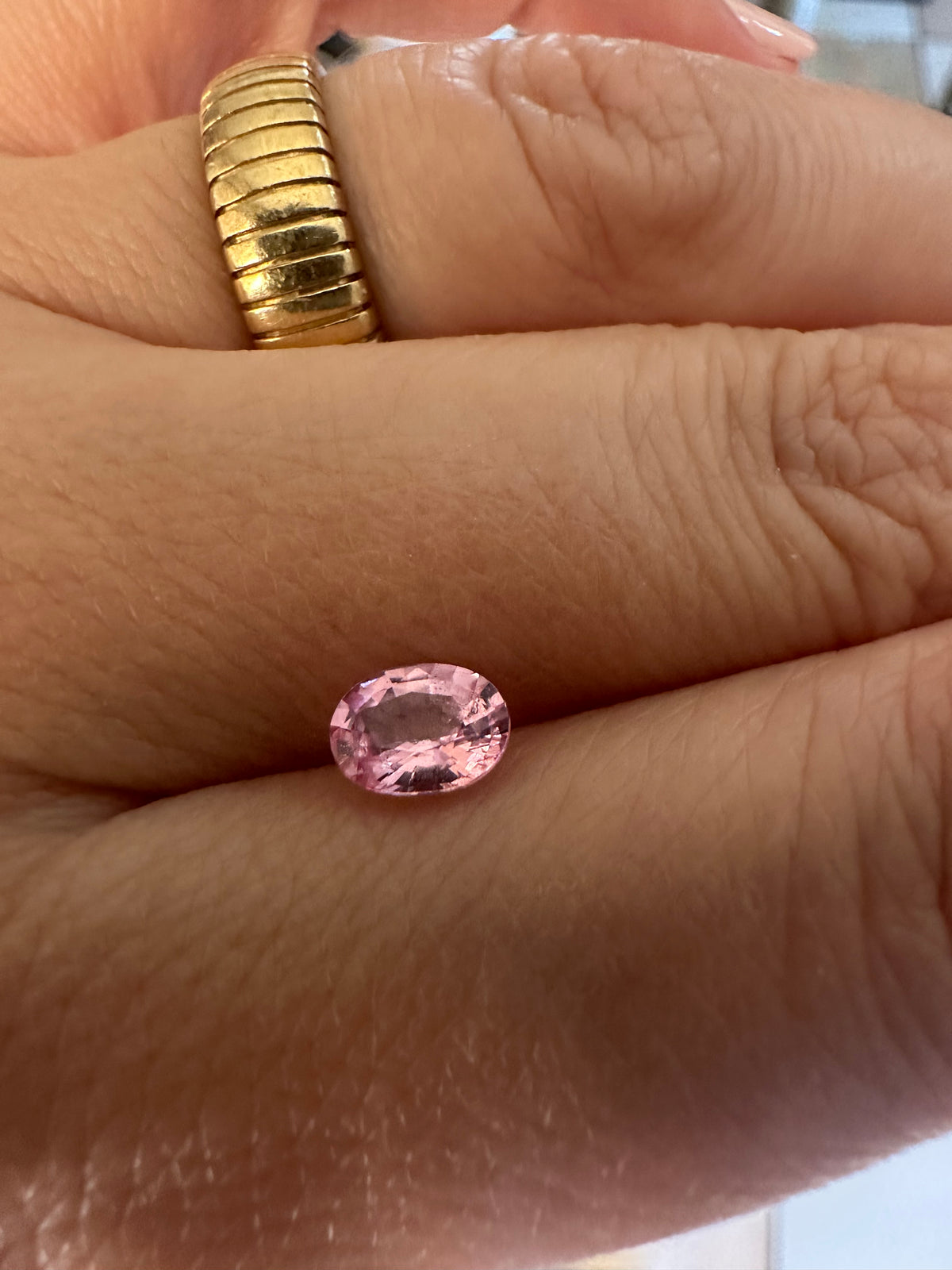 Pink spinel gemstone, oval cut, 0.80 carat, alternate view