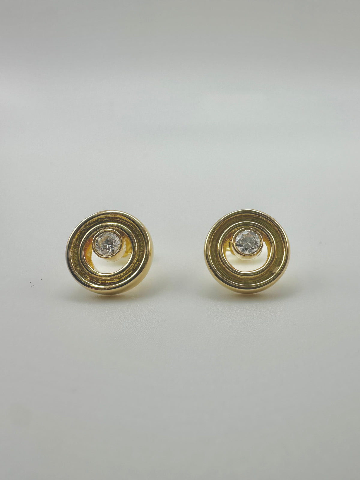 Pair of 18K gold lab diamond stud earrings, approximately 4.7 grams of gold