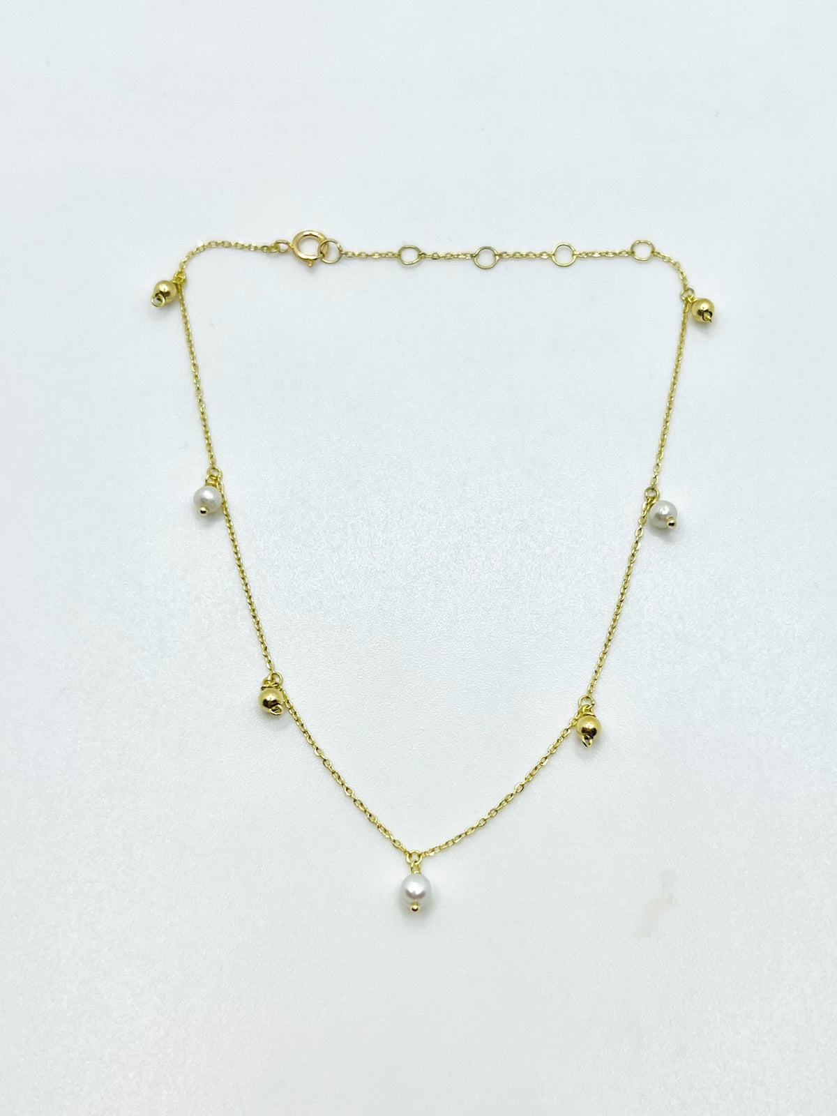 18K gold beaded anklet with a spring ring clasp