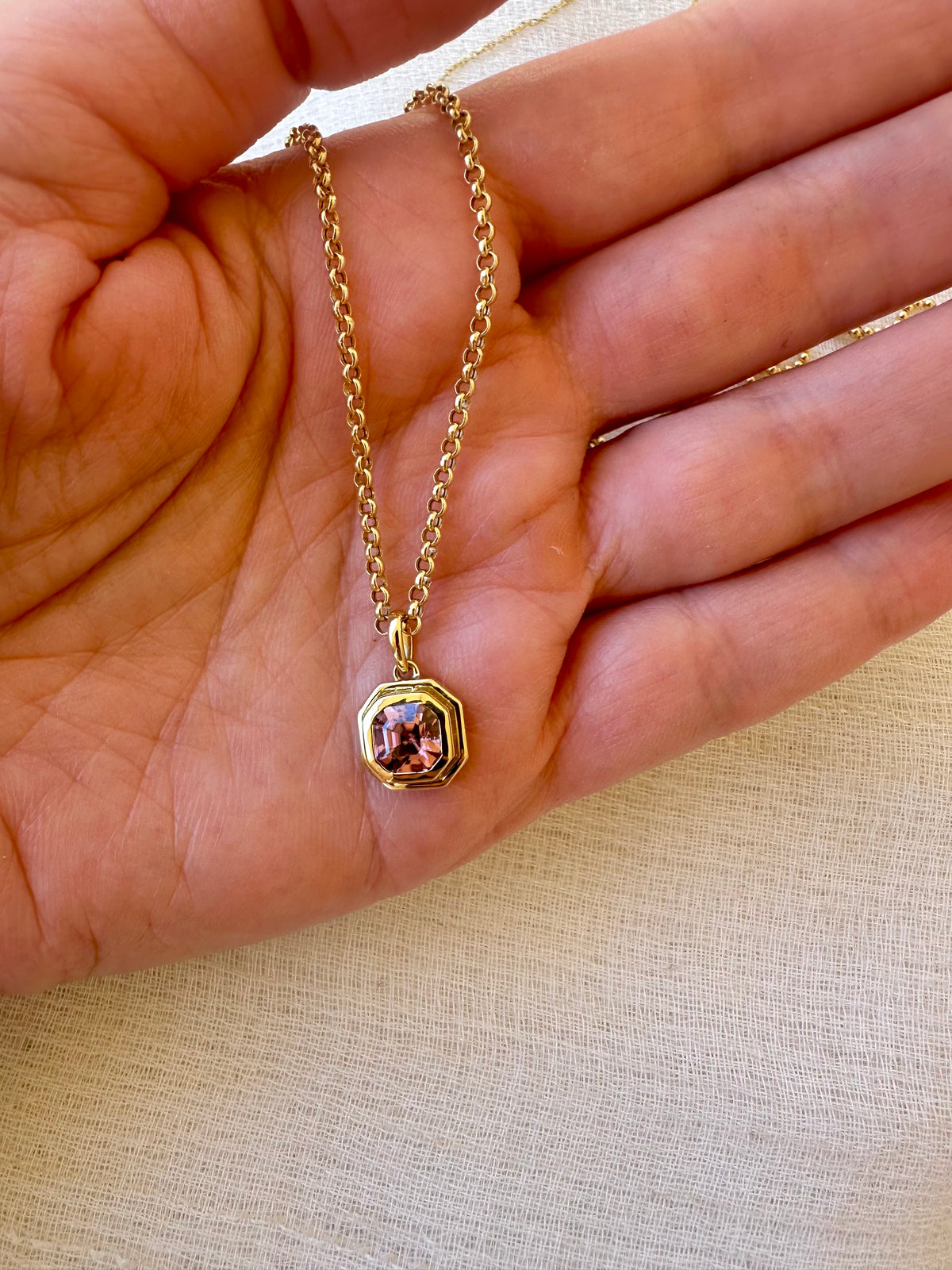 Pink zircon hexagon pendant with an open back, second view