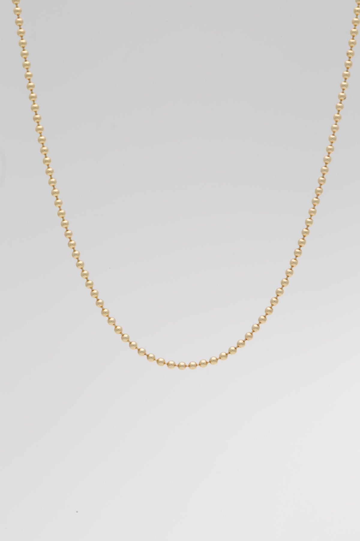 18K yellow gold bead chain with 1.5mm ball beads and a lobster clasp | Yasmin Nabulsi Fine Jewelry