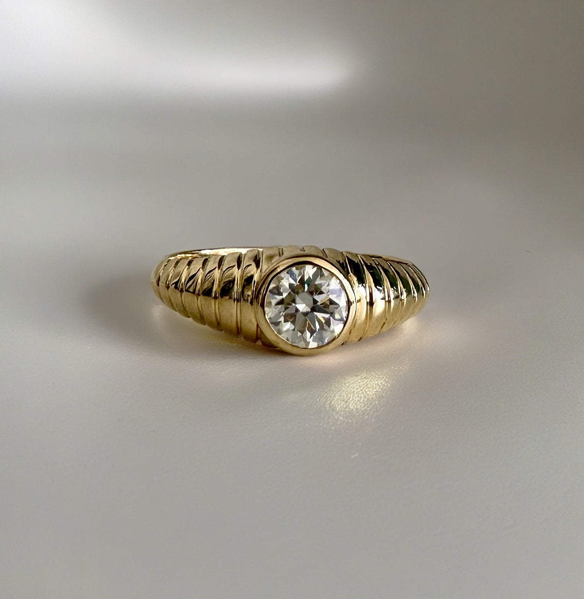 Lab diamond gold ring with a band that tapers from 6.2mm to 2.1mm