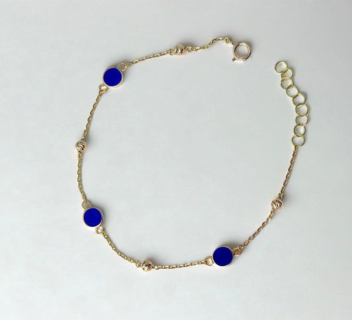 18K gold bracelet with three enamel circles and four gold beads on a dainty chain | Yasmin Nabulsi Fine Jewelry