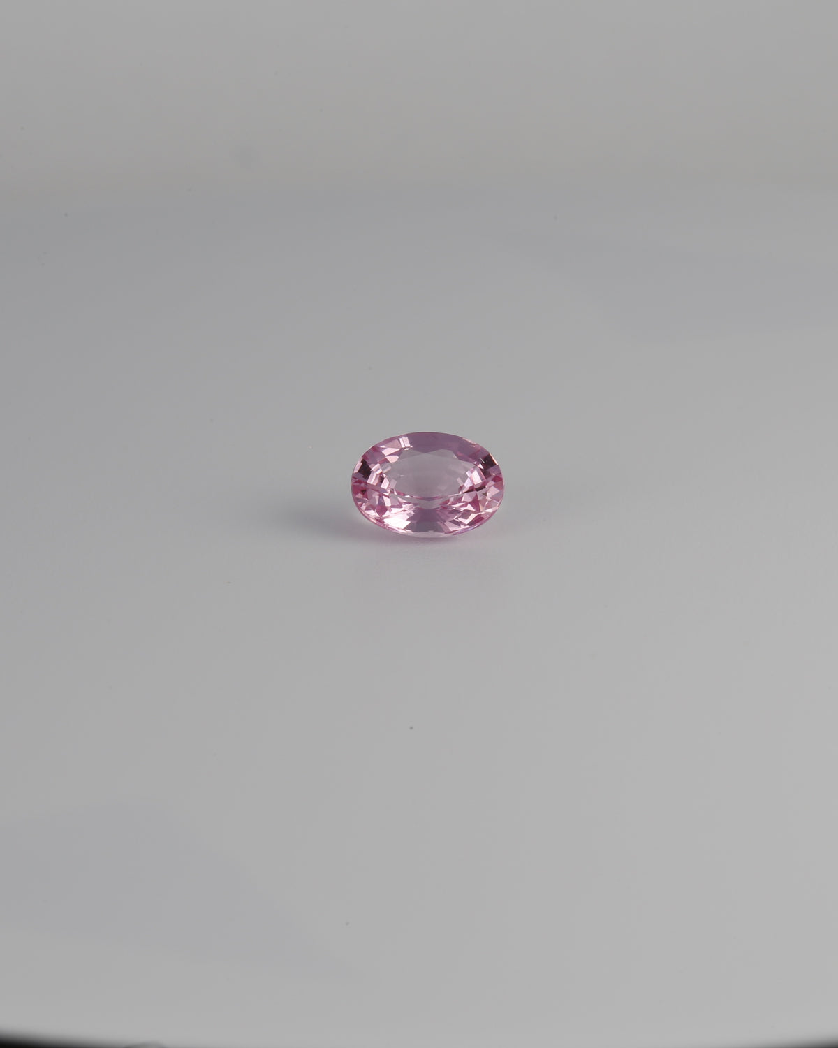 Oval pink spinel gemstone, 0.80 carats, 6.5 by 4.9 mm | Yasmin Nabulsi Fine Jewelry