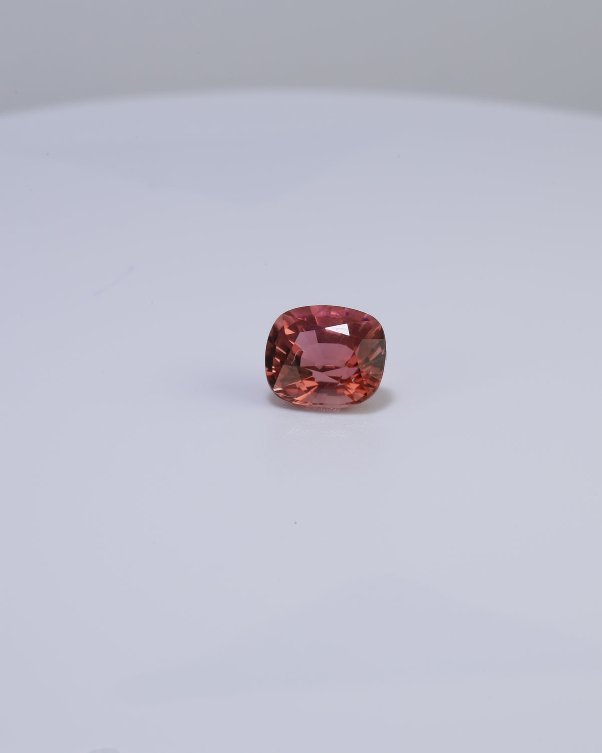 Pinkish peach cushion cut tourmaline, 1.42 carats, 7.1 x 6.2mm | Yasmin Nabulsi Fine Jewelry