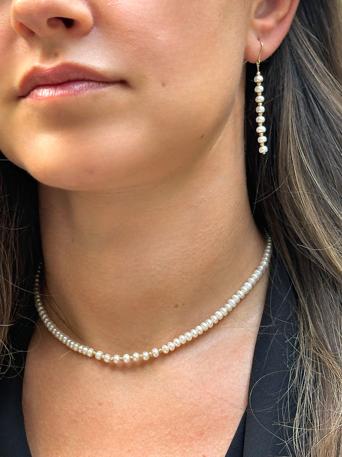 Pearl necklace and earring set styled for a bride