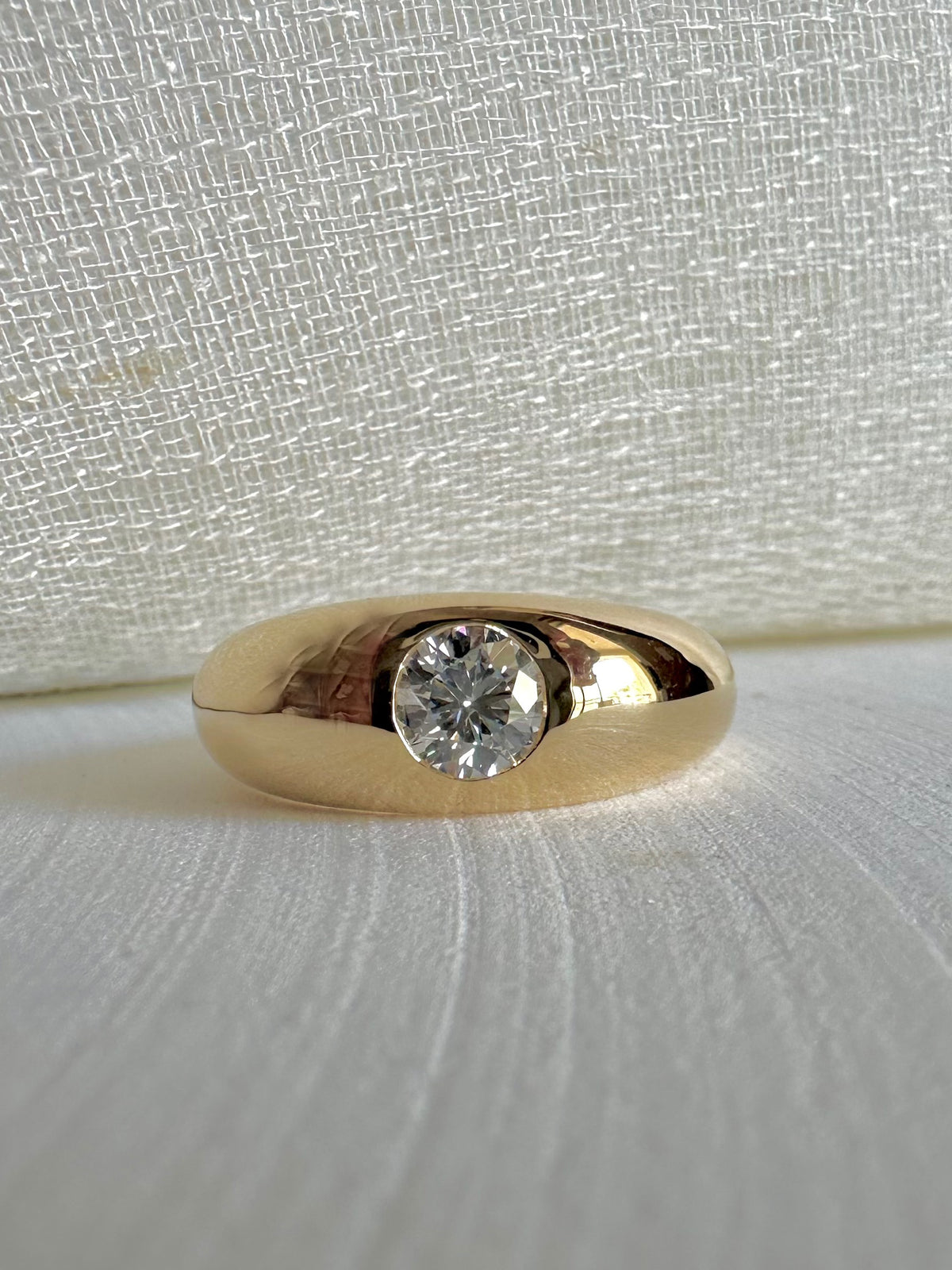 18K gold dome ring with a flush-set lab grown diamond at its center | Yasmin Nabulsi Fine Jewelry