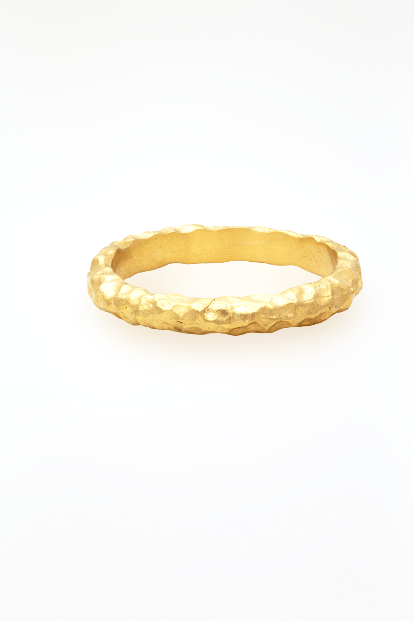 Glypto Band, a hand carved hammered gold ring with a satin matte finish