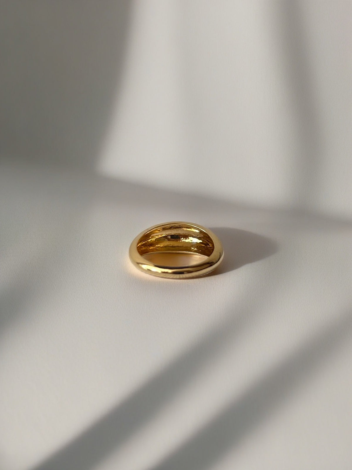 Gold dome ring handcrafted in solid 14K or 18K gold, tapering from 7.5mm to 2.5mm