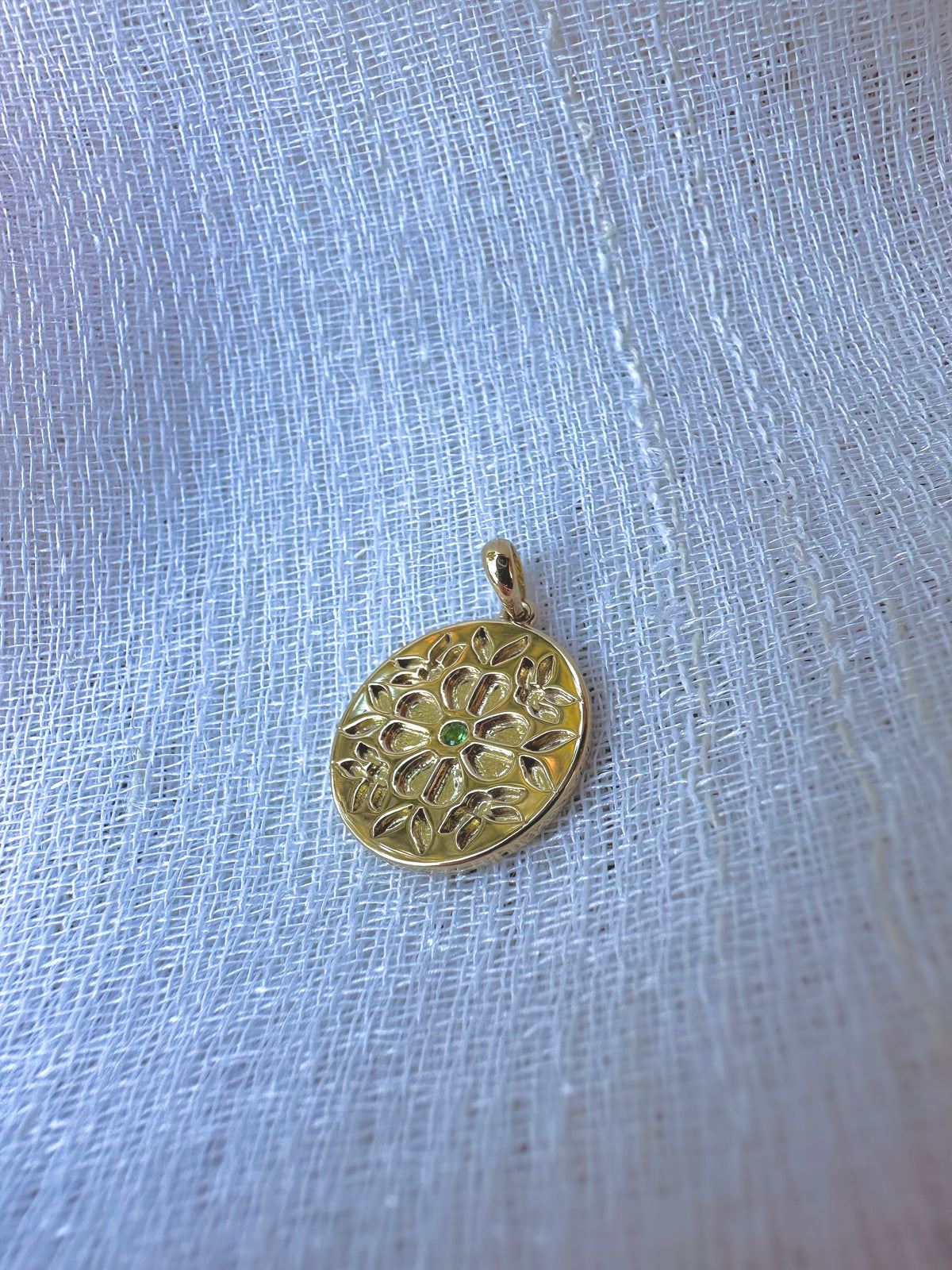 Floral Tatreez-inspired gold coin pendant in 14K or 18K gold with a center stone | Yasmin Nabulsi Fine Jewelry