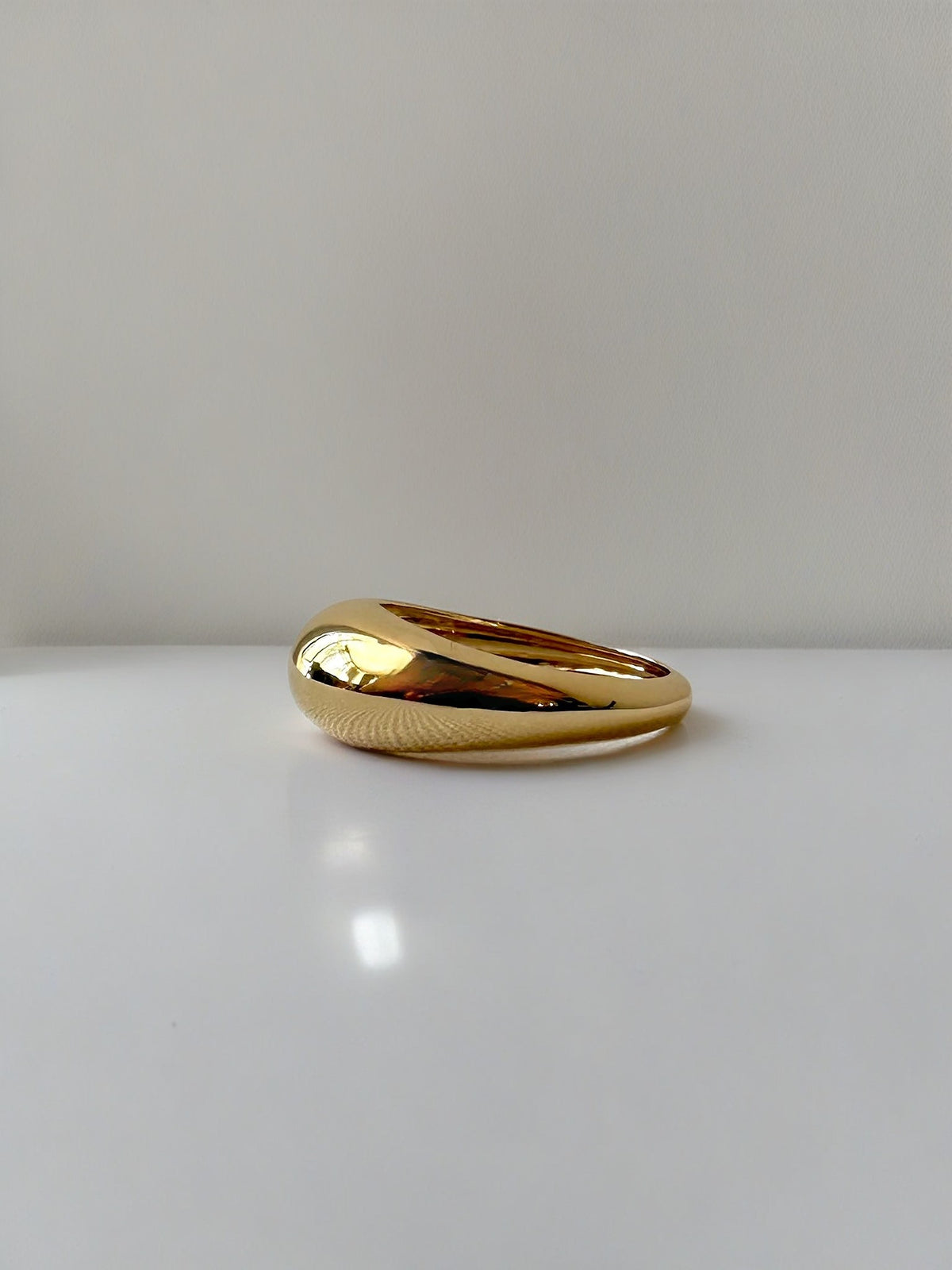 Gold dome ring in solid 14K gold, high polish, with a chunky sculptural dome | Yasmin Nabulsi Fine Jewelry