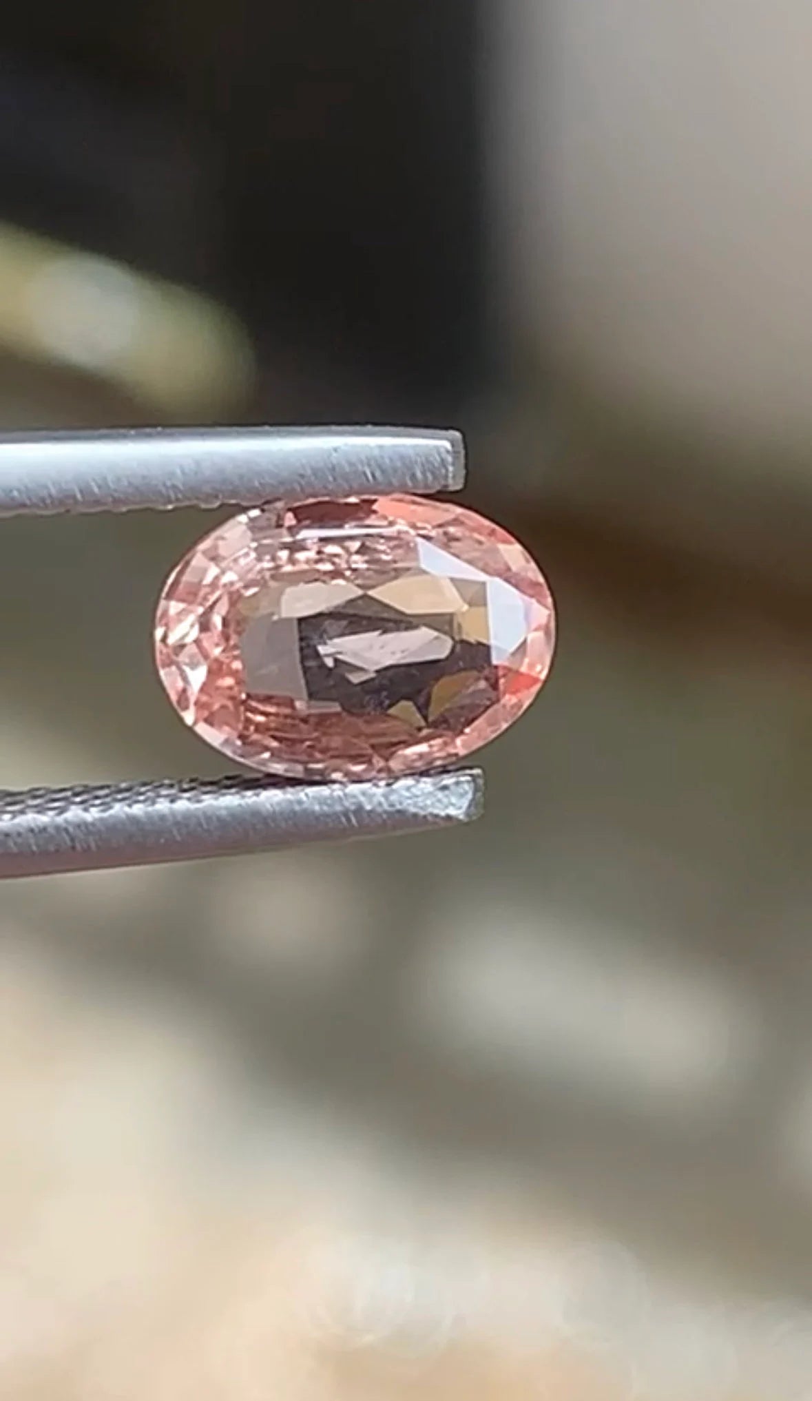 Oval mixed cut padparadscha sapphire, 1.08 carats, pinkish orange and transparent | Yasmin Nabulsi Fine Jewelry