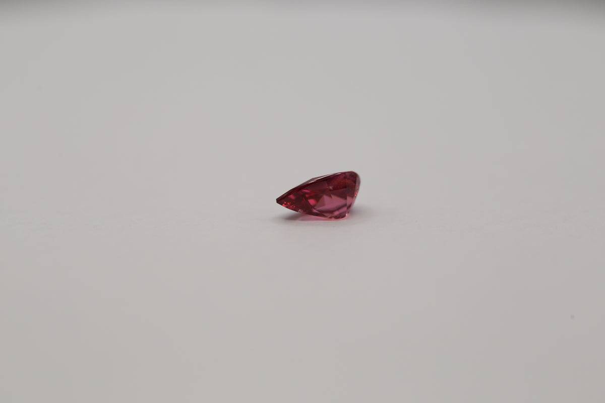 Second view of the 0.77 carat pear cut pinkish brown spinel