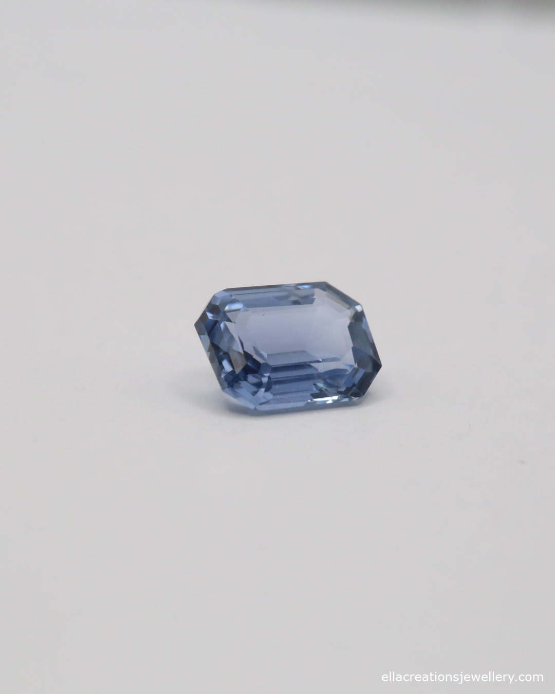 Blue sapphire 2.06ct step cut, GIA certified, shown from a second angle