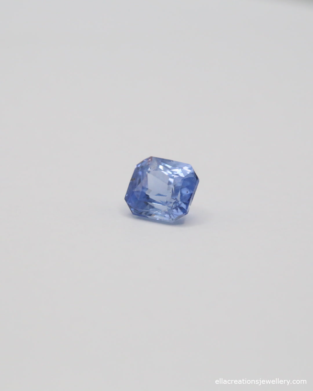 Natural blue sapphire in a cut cornered rectangular modified brilliant cut