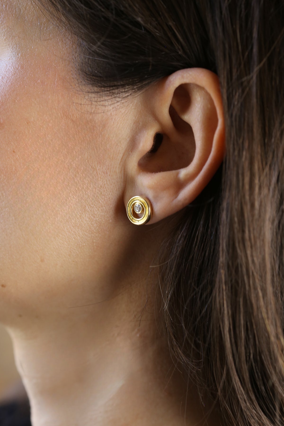 Round lab diamond stud earrings, available in yellow or white gold