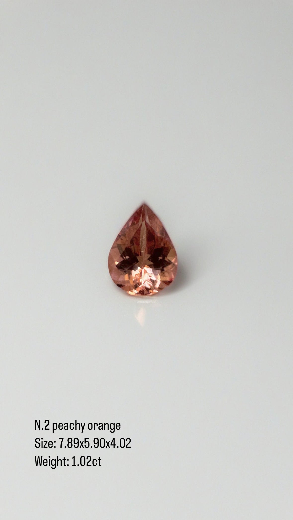 Custom made peach tourmaline teardrop pendant in 18K gold