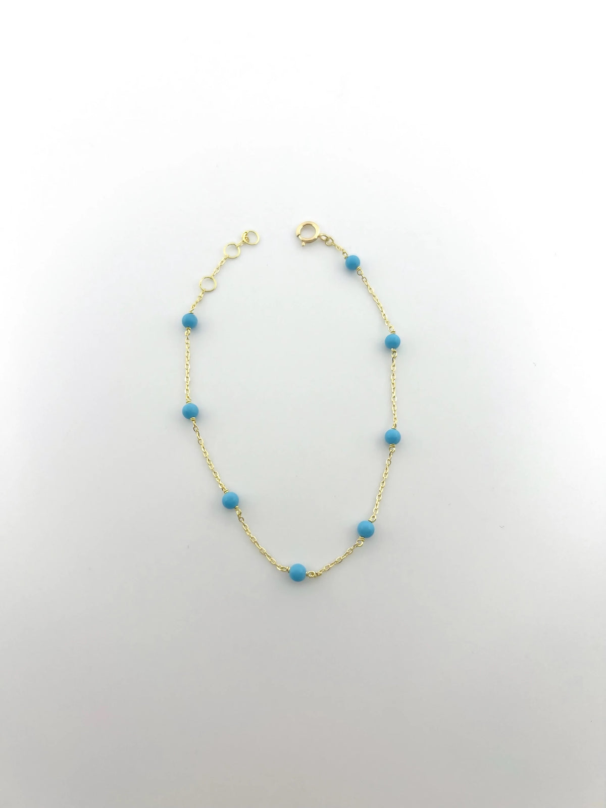 18K gold bracelet with turquoise beads and extension loops for length