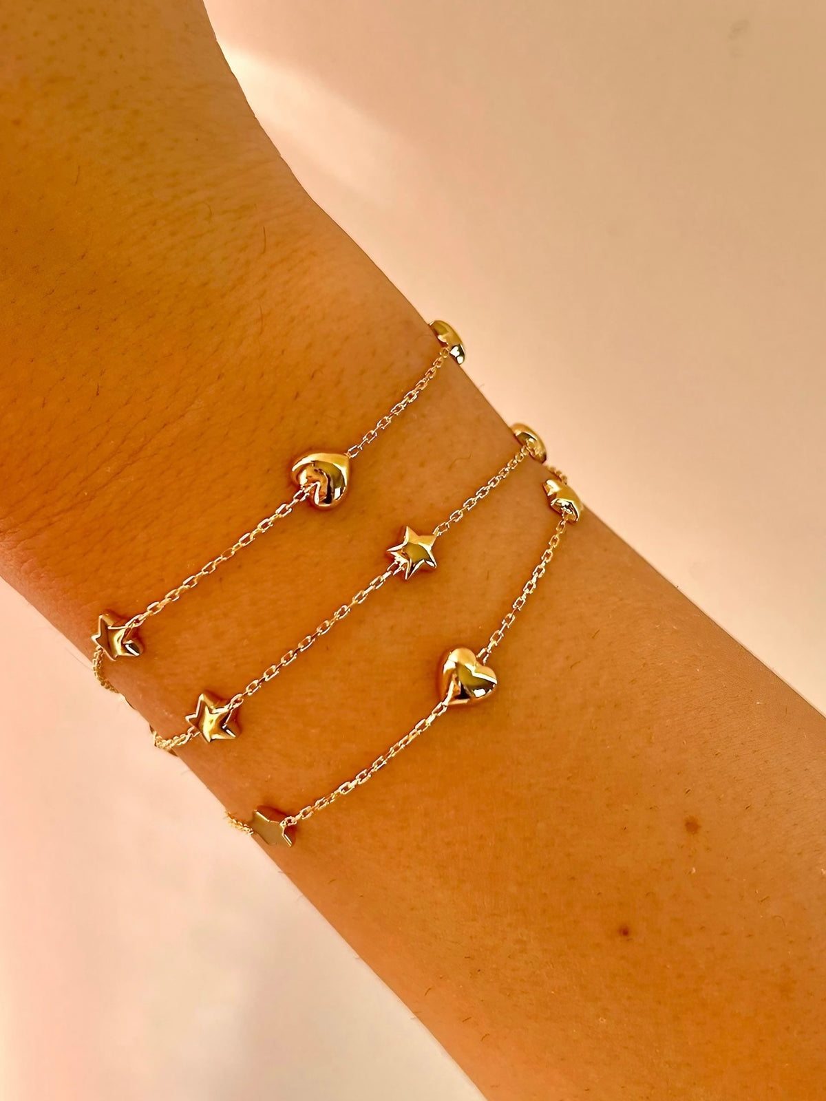 Chain bracelet with star charms in 18K solid gold