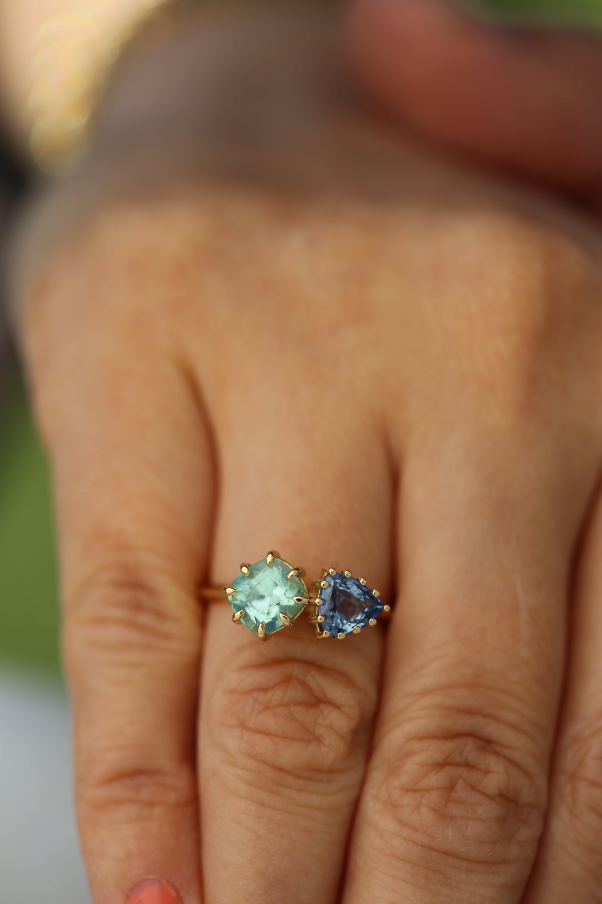 Toi et Moi ring with a green tourmaline in a claw prong setting, 18K gold
