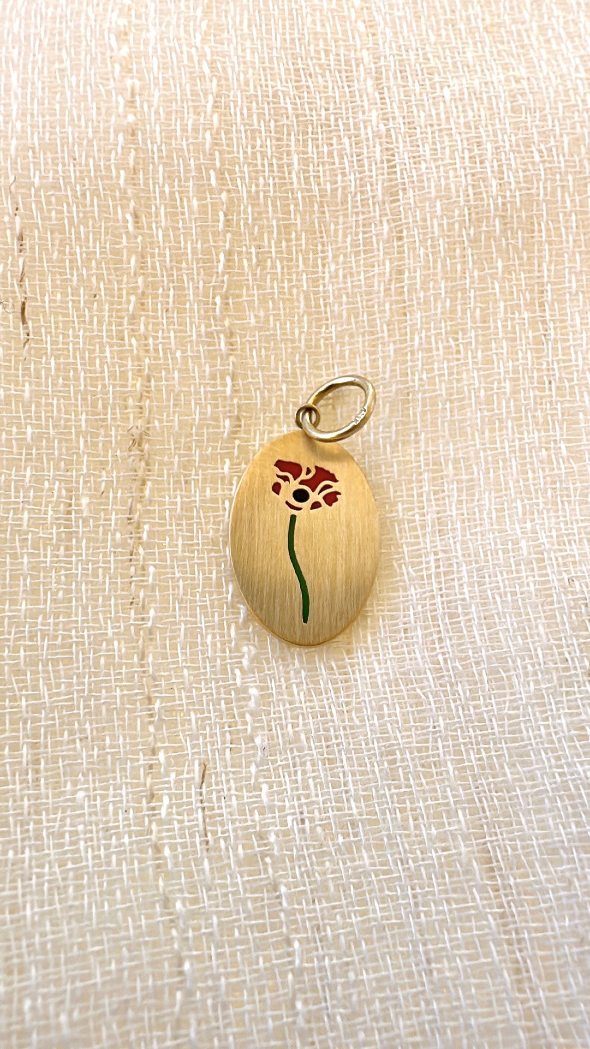 Red poppy flower charm in 18K solid gold with enamel, brushed finish | Yasmin Nabulsi Fine Jewelry