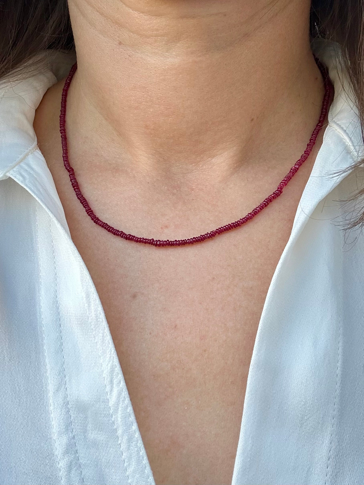 Tiny ruby beaded necklace with natural 2mm ruby beads and 18K solid gold findings | Yasmin Nabulsi Fine Jewelry