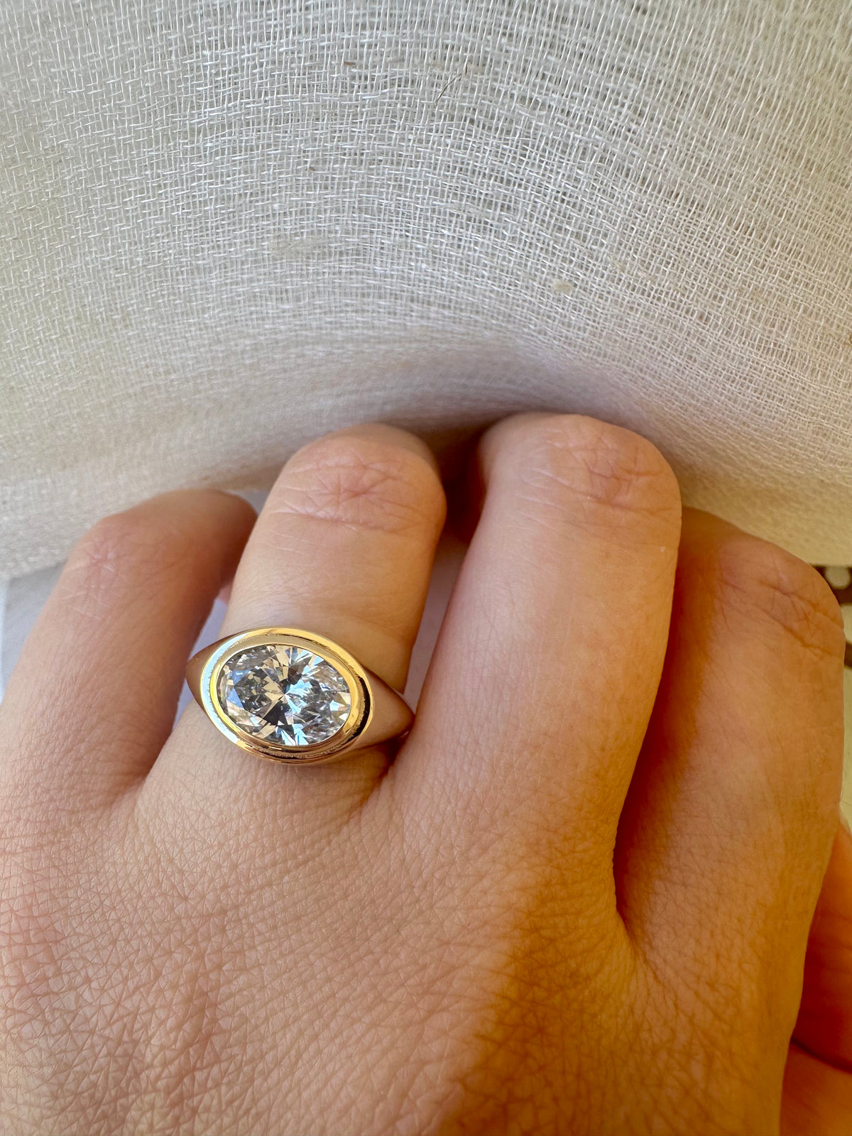 Oval lab diamond signet ring in a smooth polished finish