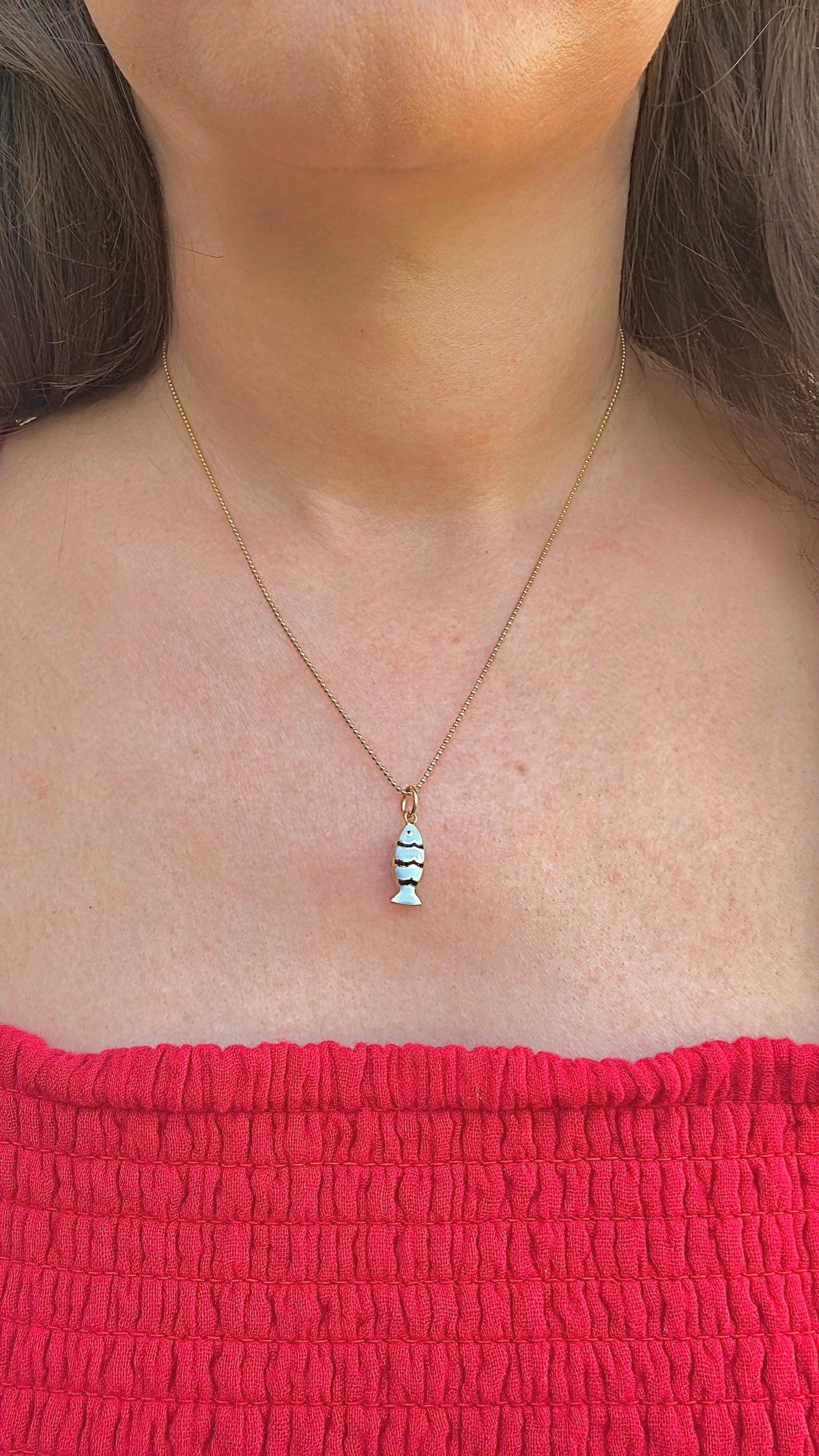 18K yellow gold fish charm with light blue and black enamel, second view