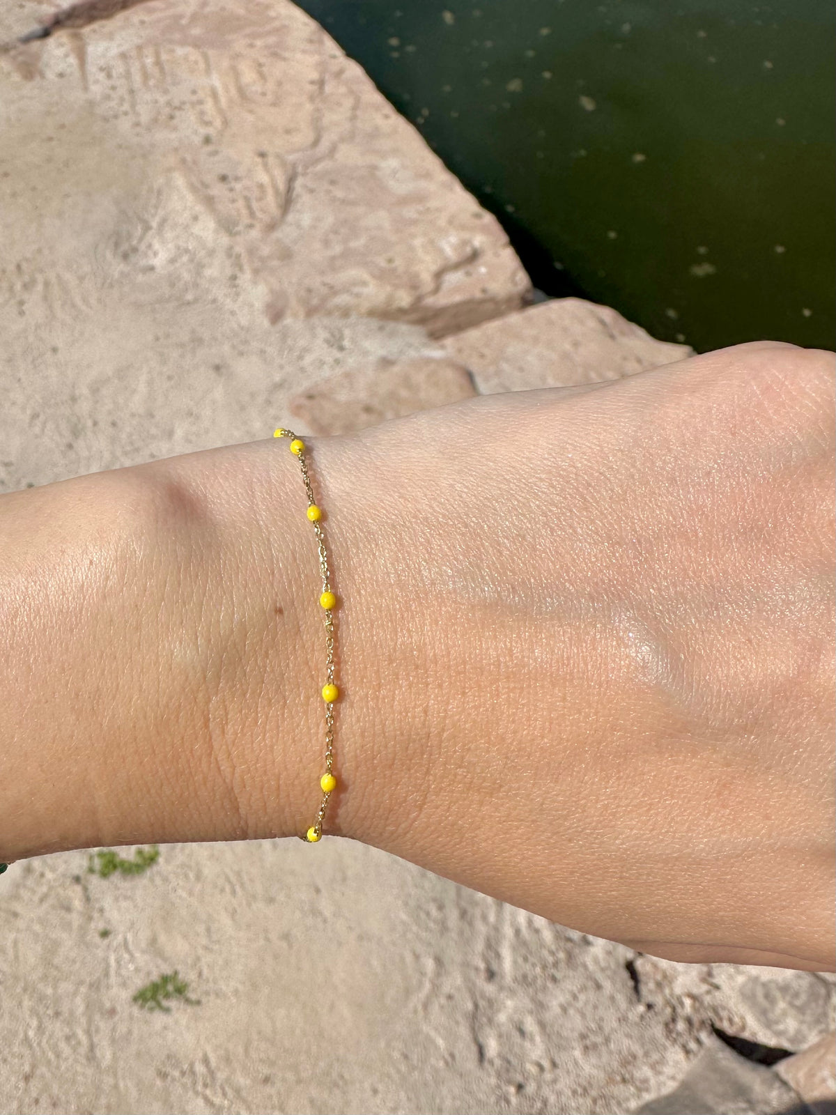 Yellow enamel bead station bracelet in 18K gold