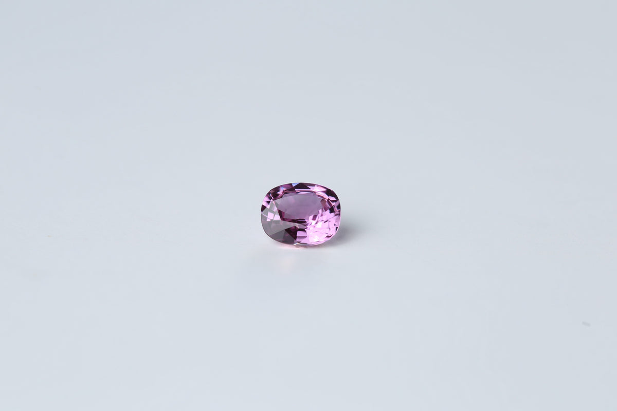 Unheated cushion cut pink sapphire gemstone, 0.74 carats, 5.6 x 4.8 mm | Yasmin Nabulsi Fine Jewelry