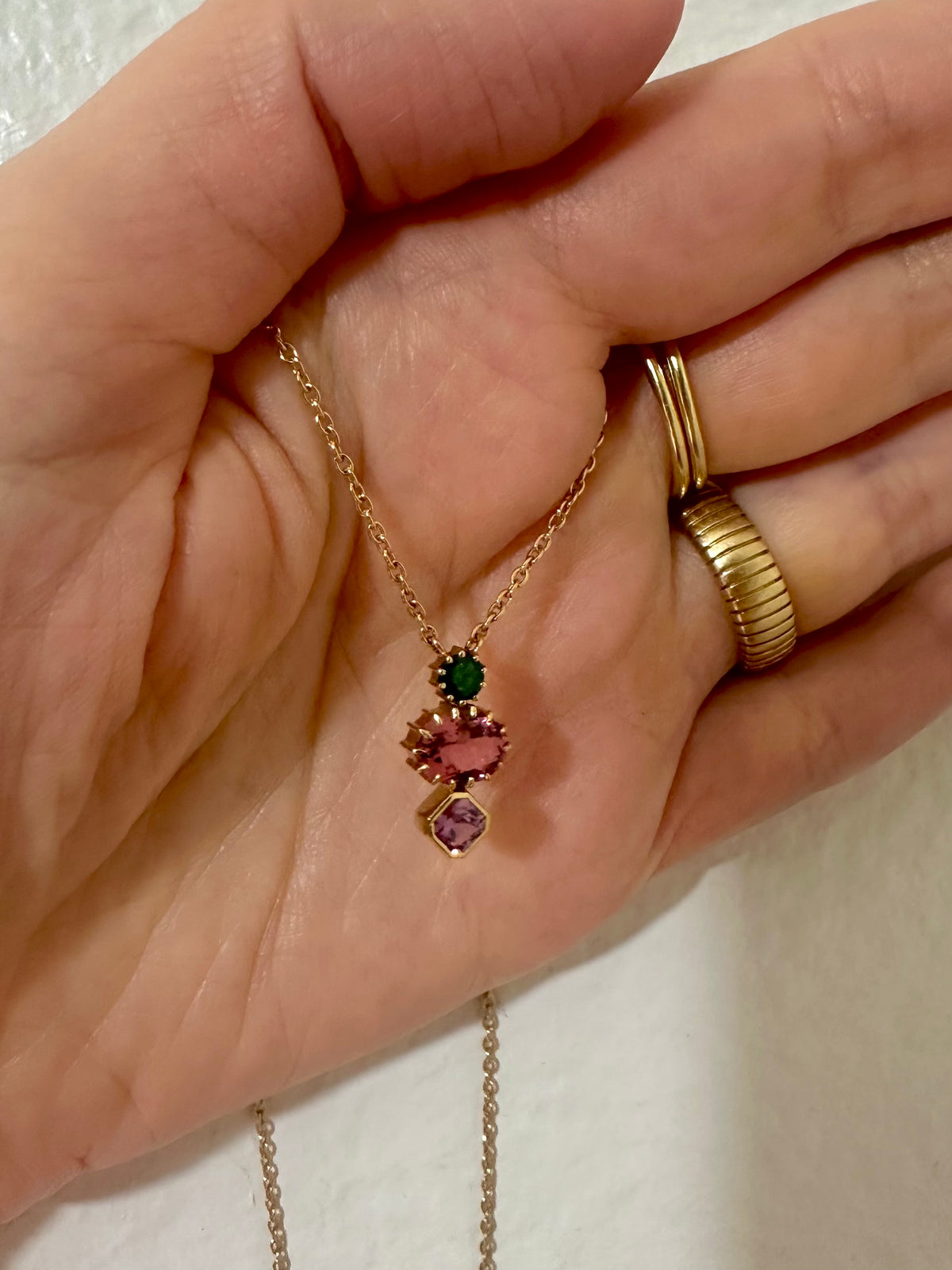 Three stone necklace in 18K yellow gold with emerald, tourmaline and sapphire | Yasmin Nabulsi Fine Jewelry