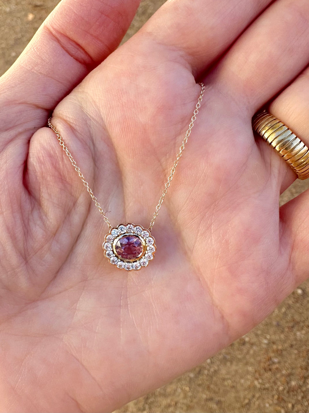 Oval halo pendant with a center stone choice of peridot, garnet, pink spinel, aquamarine, morganite or sapphire