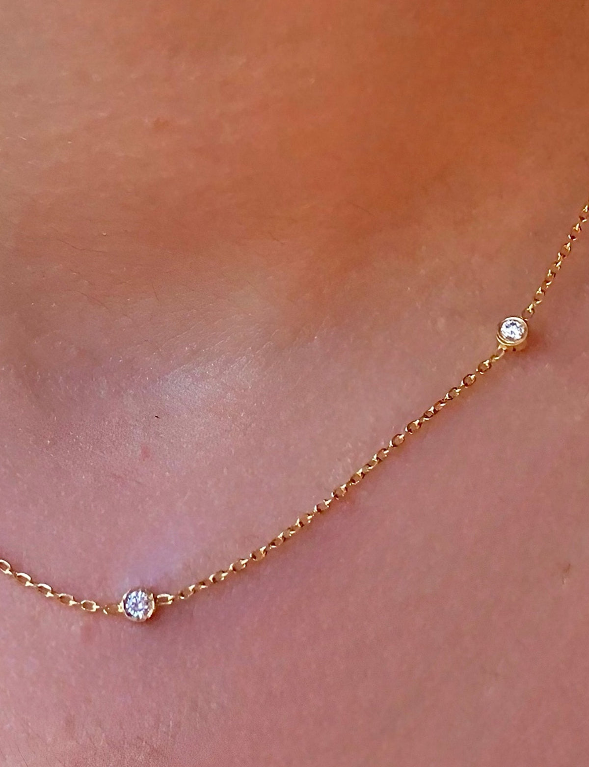 Dainty diamond station necklace in 18K gold, petite style
