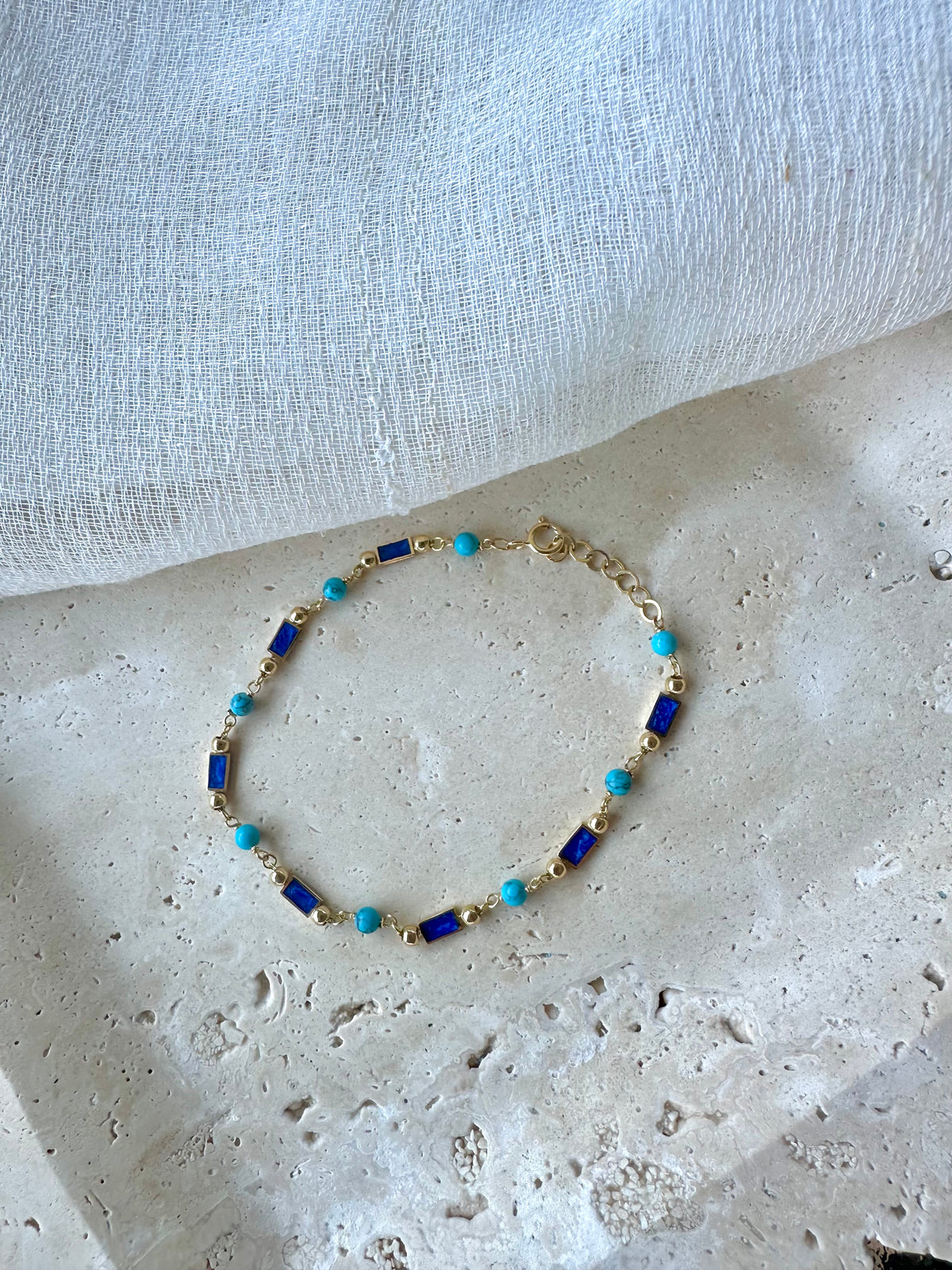 18K gold bracelet with alternating turquoise beads and royal blue enamel links | Yasmin Nabulsi Fine Jewelry