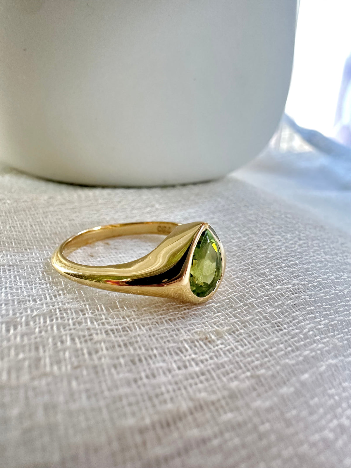 Flat top peridot signet ring, 8.8mm wide at the top, tapering to 2.5mm