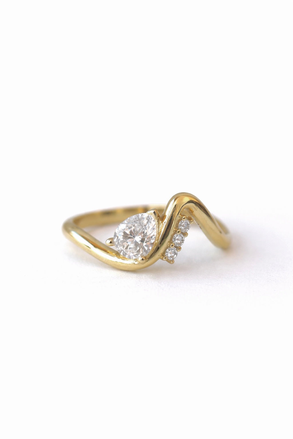 Wave ring with 1.8mm lab diamond accents set along the bottom of the wave