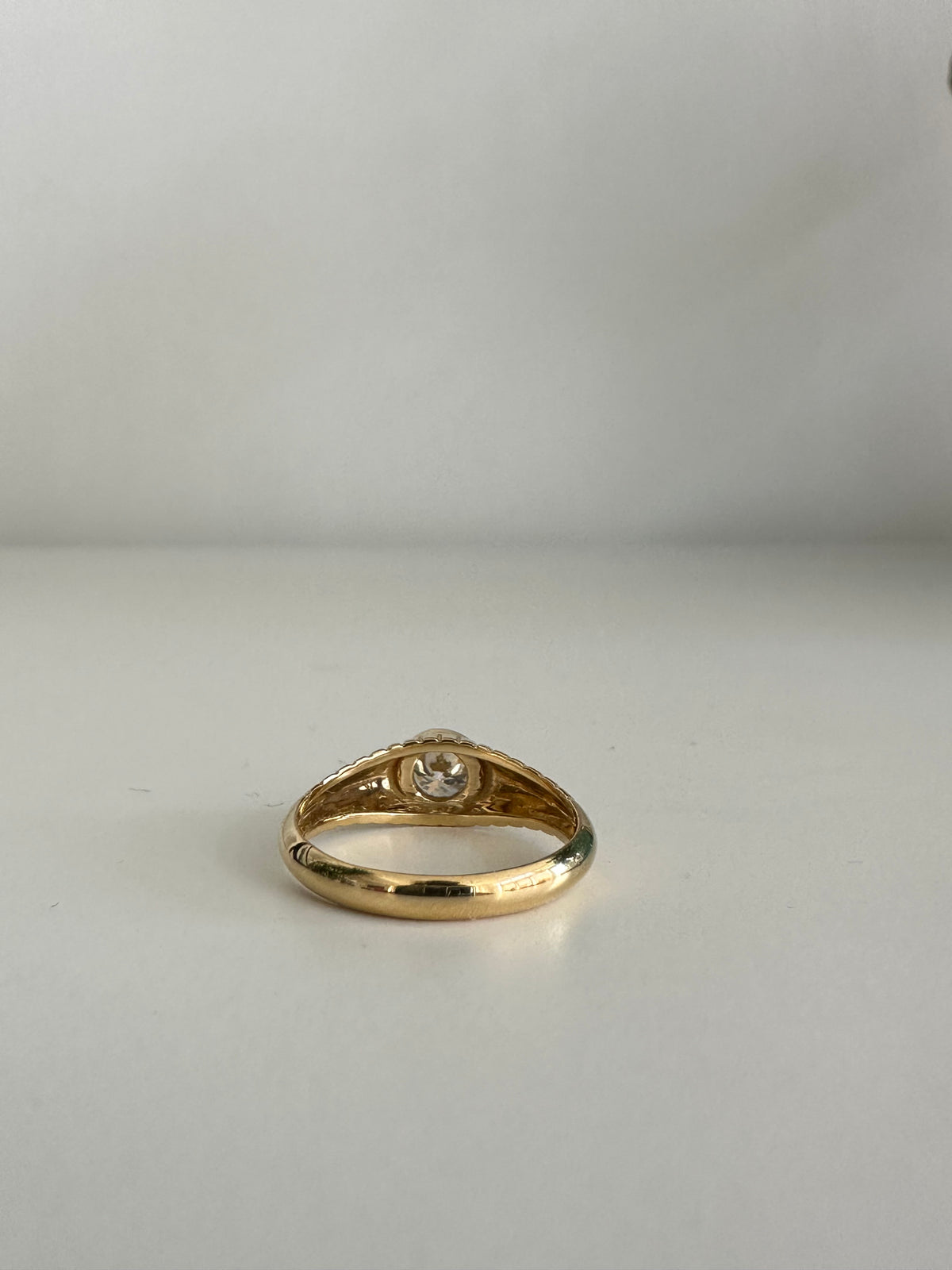 Lab diamond ring with an intricate ribbed band, a second view