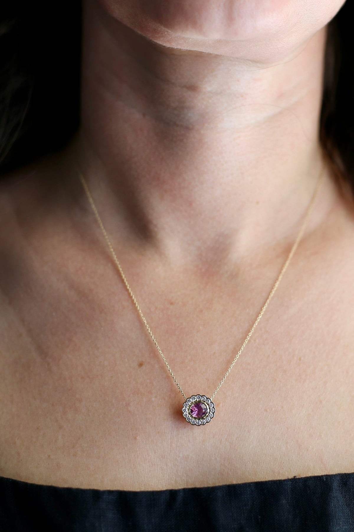Oval halo pendant that can also be made in 18K gold, with custom gemstones on request