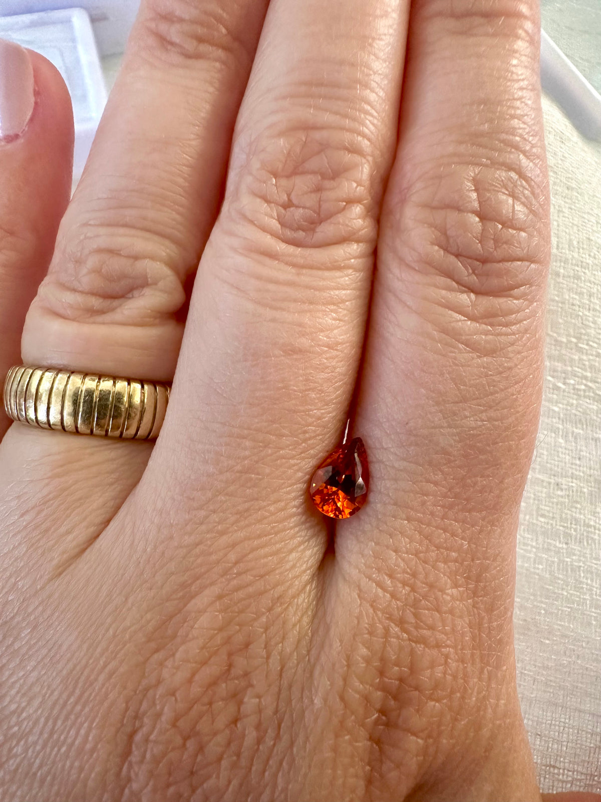 Spessartite garnet stone in pear shape, second view