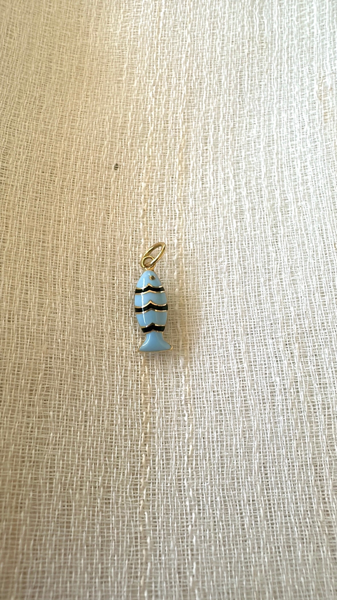 18K gold fish charm with blue enamel, stackable with other charms