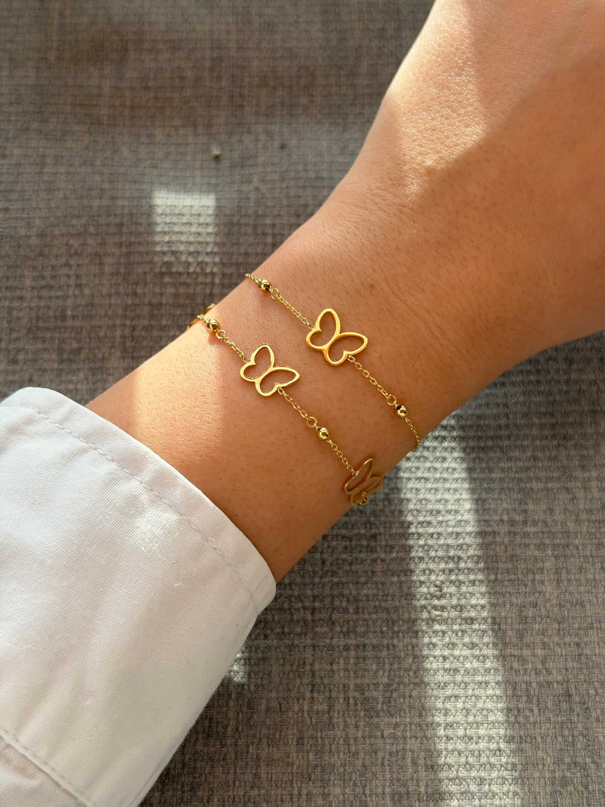 18K butterfly bracelet for everyday wear, shown from another angle