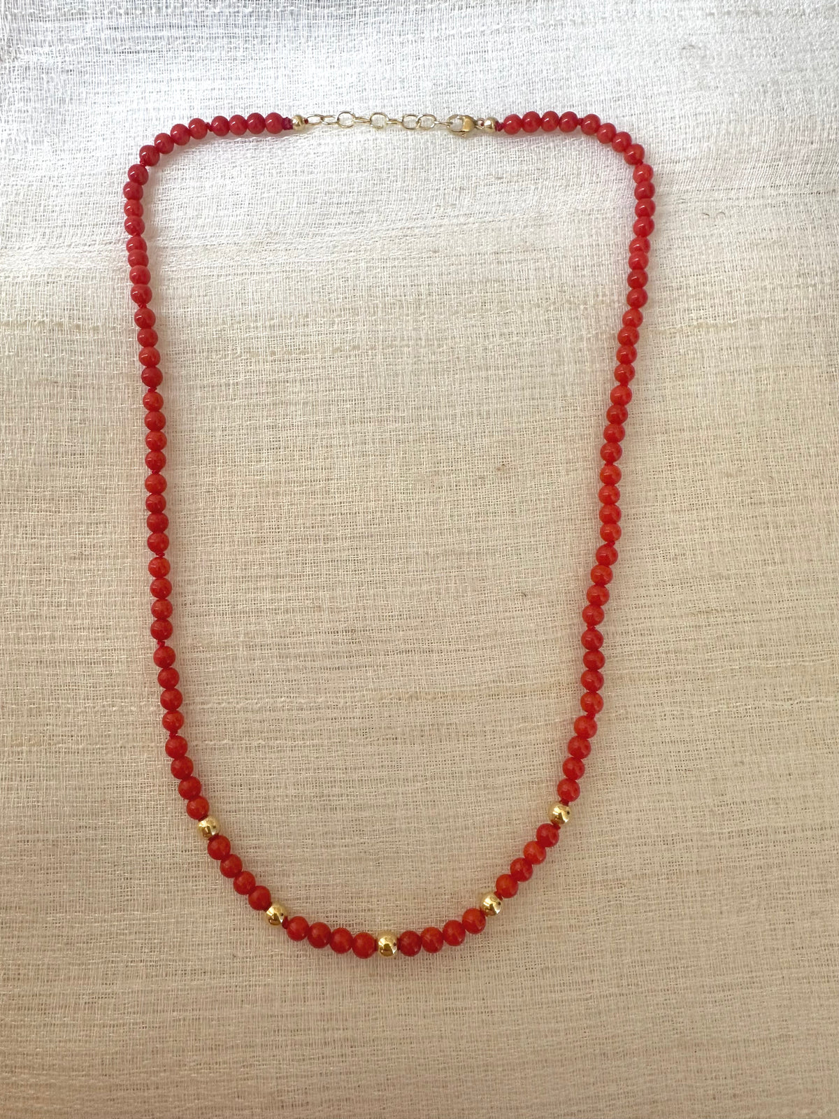 Red coral beaded necklace with a 14K solid gold lobster clasp