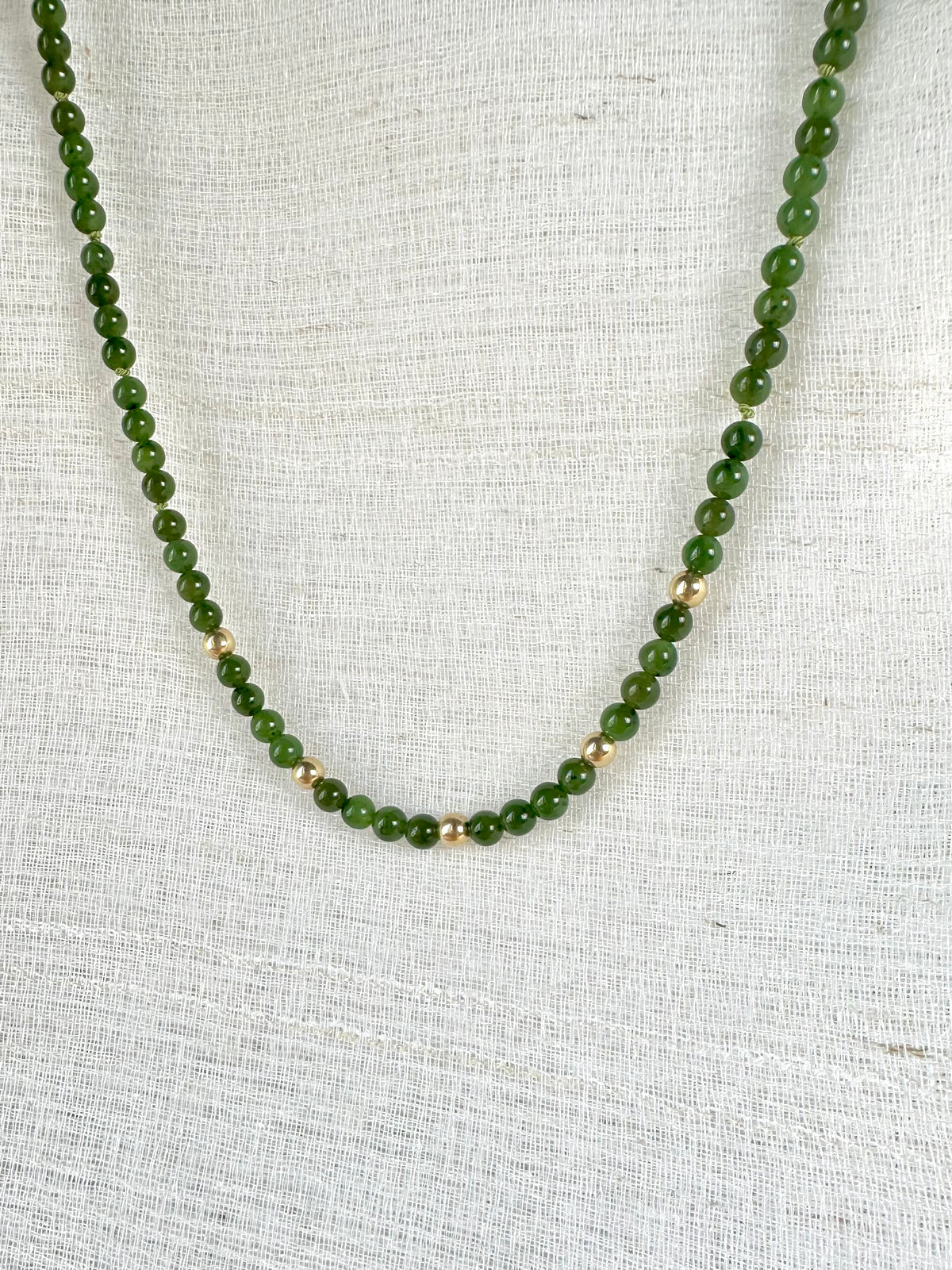 Jade beaded necklace with solid gold findings, hand threaded natural Canadian jade | Yasmin Nabulsi Fine Jewelry