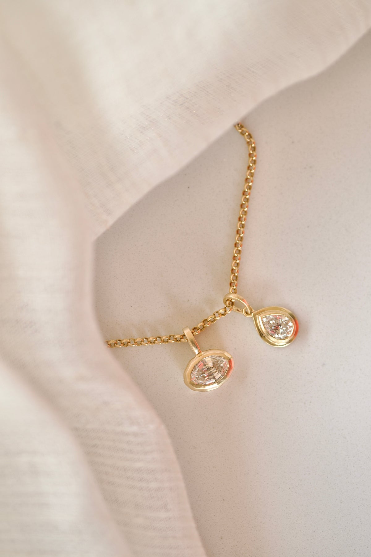 Lab diamond pendant with a satin gold finish, 11mm high
