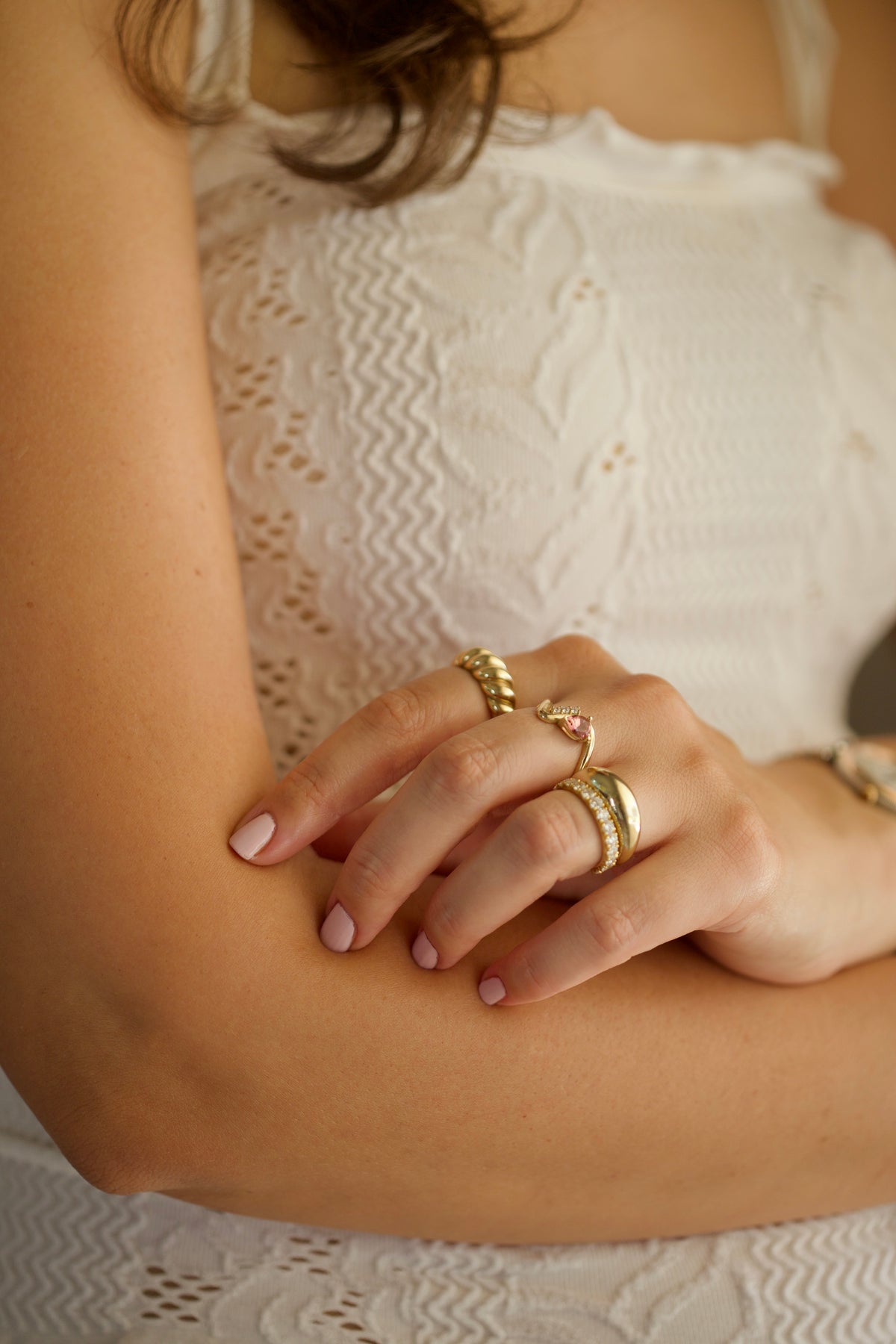 Croissant ring with a 7.5mm crown tapering to 1.6mm at the back, worn on a hand